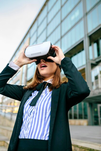 Businesswoman using VR goggles