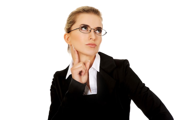 Photo businesswoman wearing black suit while standing against white background