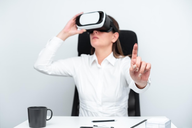 Businesswoman Wearing Virtual Reality Headset And Gesturing While Learning Professional Skill Through Simulation Woman Sitting At Desk And Experiencing Modern Technology