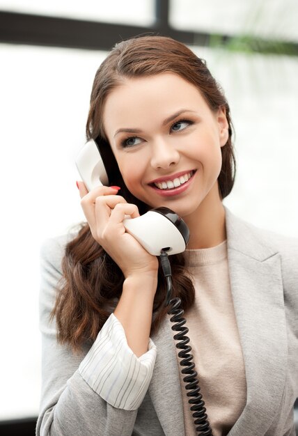 businesswoman with cell phone calling or talking