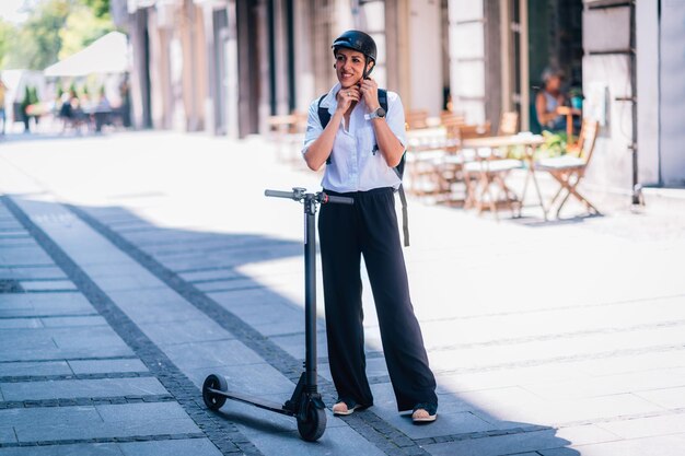 Businesswoman with Electric Scooter