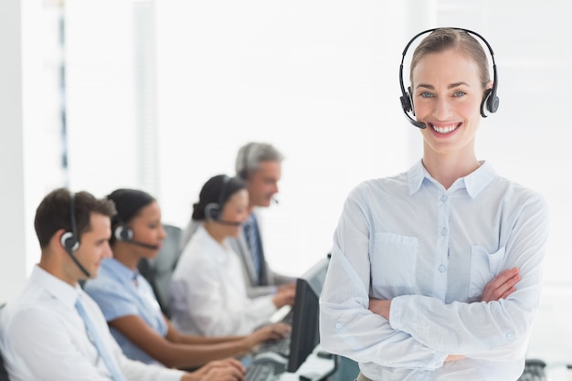 Businesswoman with executives using computers