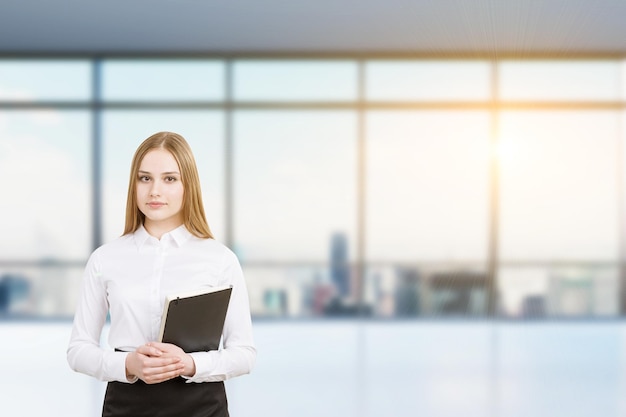 Businesswoman with folder