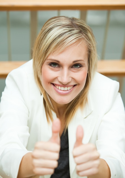 Businesswoman with her thumbs up