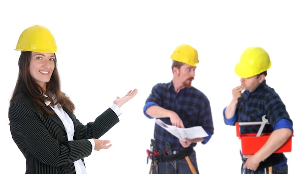 Businesswoman with successful construction workers