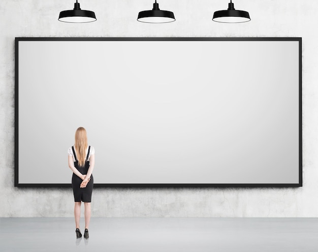 Businesswoman with whiteboard