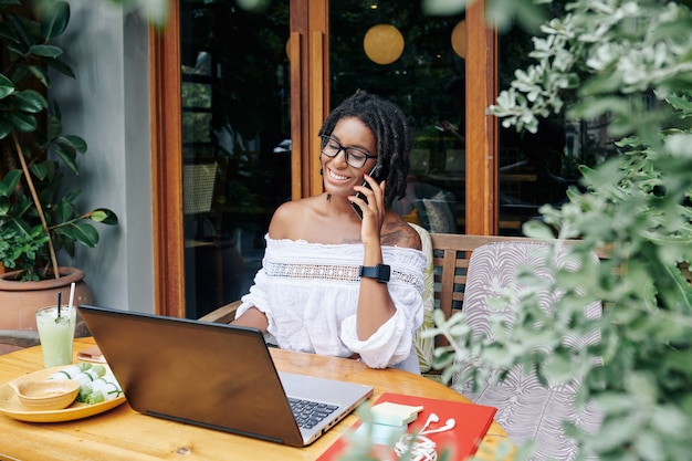 Businesswoman working at cafe