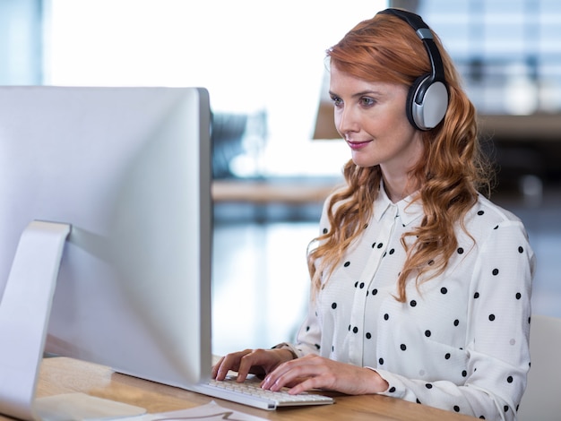 Businesswoman working on computer