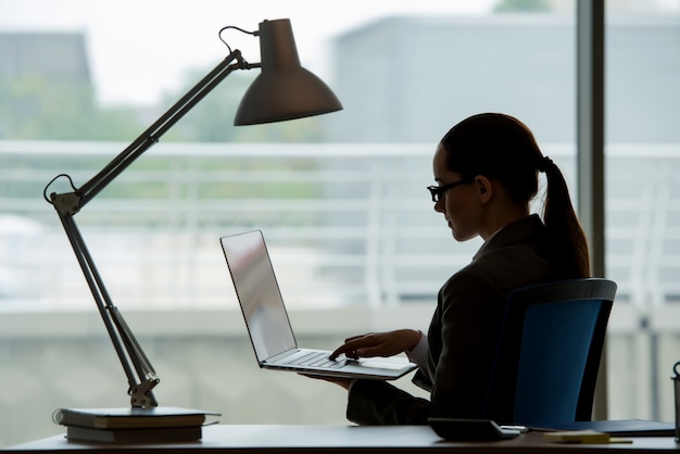 Businesswoman working at her desk