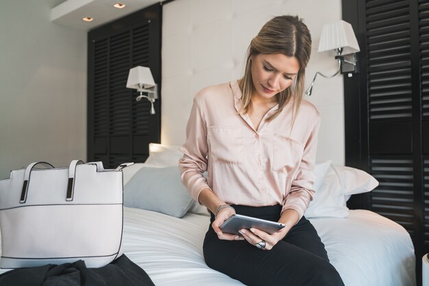 Businesswoman working on her digital tablet