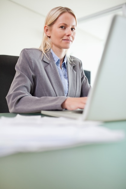 Businesswoman working on her notebook