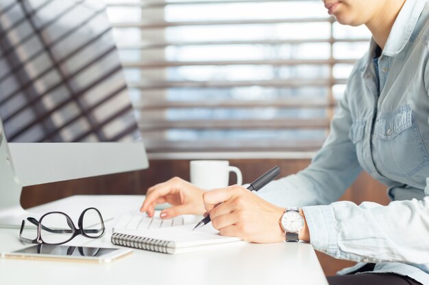 Businesswoman working at her office