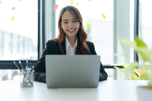 Businesswoman working on a laptop for business information