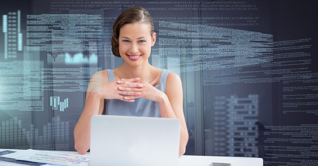 Businesswoman working on laptop with screen text interface