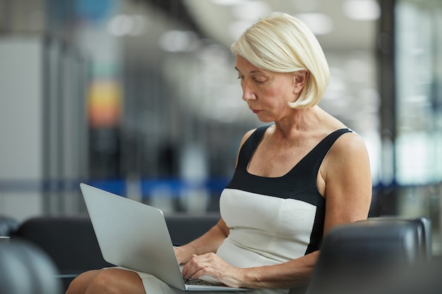 Businesswoman working on laptop