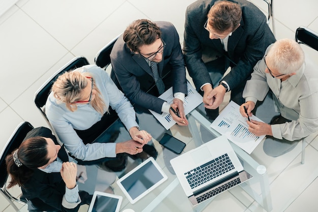 Businesswoman at a working meeting with the business team