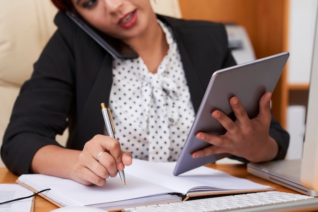 Businesswoman working over new plans