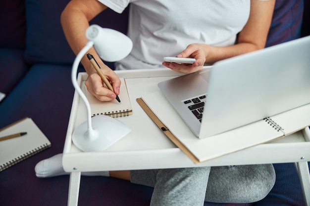 Businesswoman working online during isolation at home