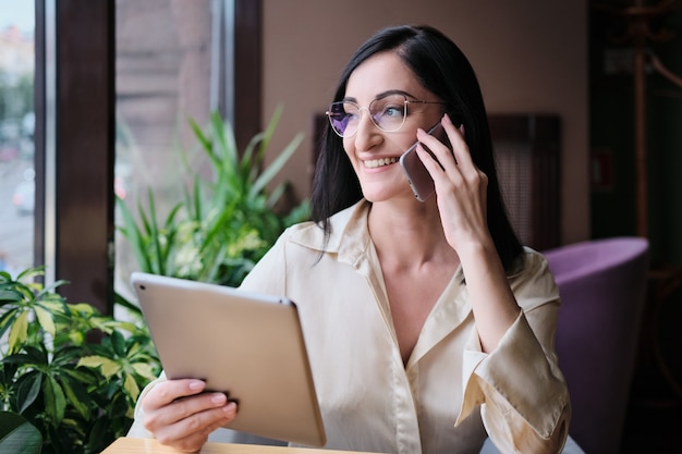 Businesswoman working on a tablet