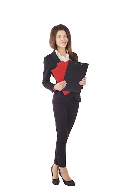 Businesswoman working with clipboard - studio background