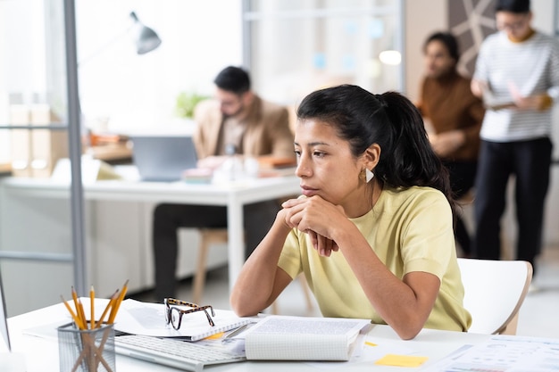 Businesswoman working with documents at her workplace