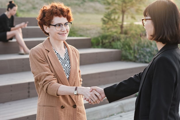 Businesswomen Greeting Each Other