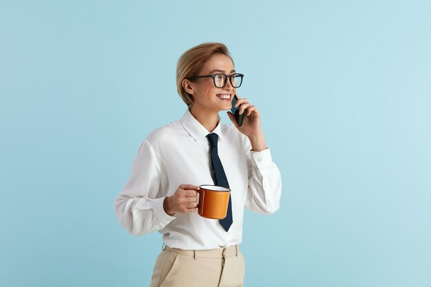 Busy Businesswoman Holding Coffee Portrait of Woman in Glasses Talking Mobile