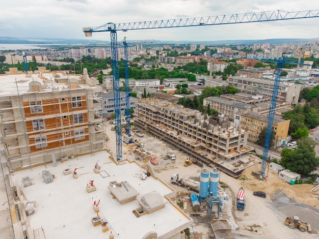 Busy Construction Site and Construction Equipment Aerial view