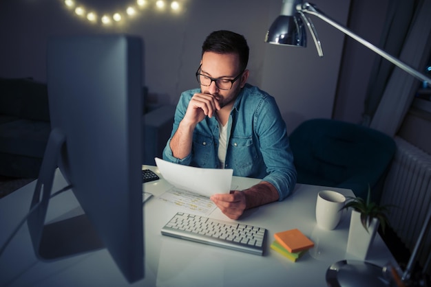 Busy man working at home