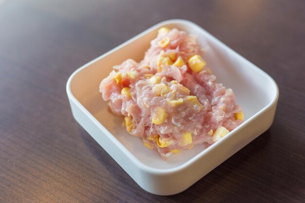 Butacorn minced pork mixed with corn flavored mellow delicious was served for Sukiyaki restaurant .