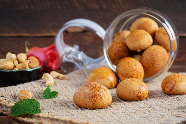 Butter cookies on wooden background Delicious honey gingerbread