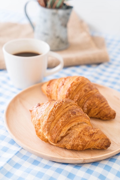 butter croissant on table