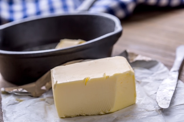 Butter. fresh butter on the kitchen table.