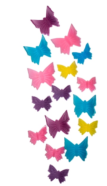 Photo butterflies of sweet marzipan isolated on a white surface.