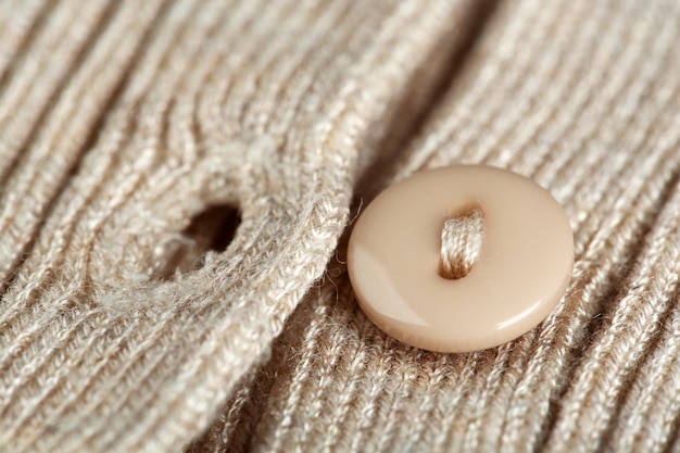 Button on clothes close up