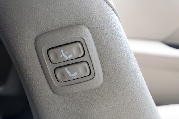 Photo buttons for adjusting seat position.