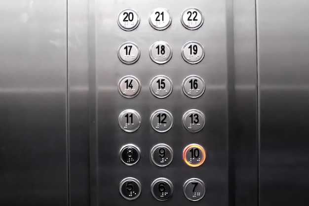 Buttons in the elevator cabin Dedicated button with the number 10 in the elevator