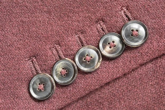 Photo buttons on wool coat