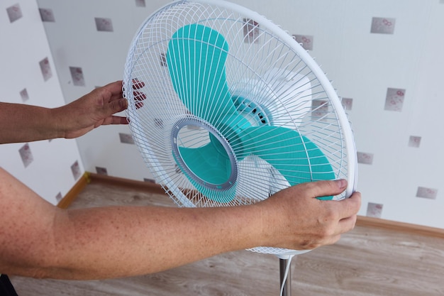 Buyer independently assembles floor fan purchased disassembled using parts from factory packaging