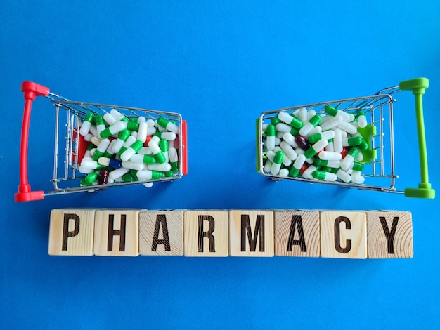 Buying and buying medicine Various capsules pills and medicines in a shopping cart