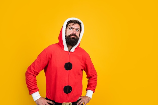 By golly be jolly present and gift shopping sale happy new year merry christmas cheerful bearded man in santa claus costume brutal hipster celebrate xmas party winter holiday preparations