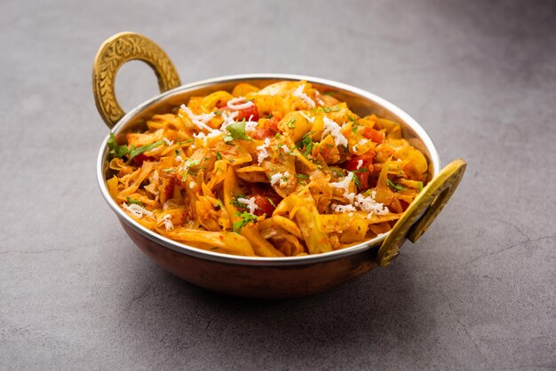 Cabbage coconut sabzi or vegetable with turmeric powder also known as patta gobi ki sabji, stir fried popular Indian food