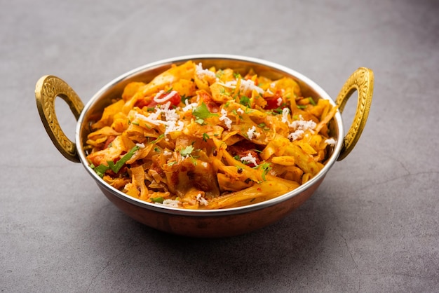 Cabbage coconut sabzi or vegetable with turmeric powder also known as patta gobi ki sabji, stir fried popular Indian food