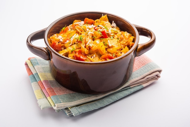 Cabbage coconut sabzi or vegetable with turmeric powder also known as patta gobi ki sabji, stir fried popular Indian food