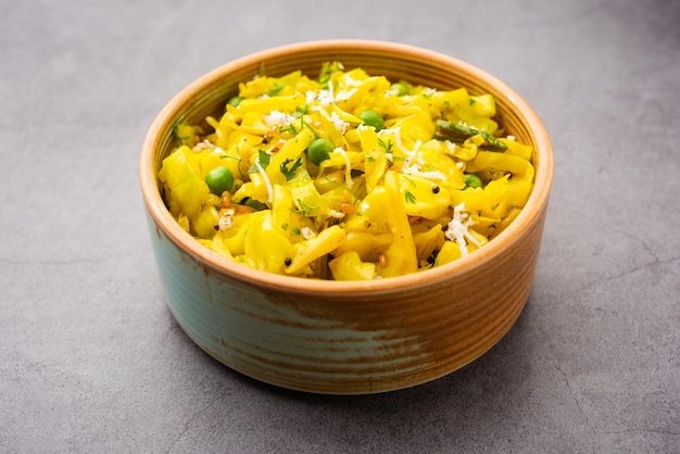 Cabbage coconut sabzi or vegetable with turmeric powder also known as patta gobi ki sabji, stir fried popular Indian food