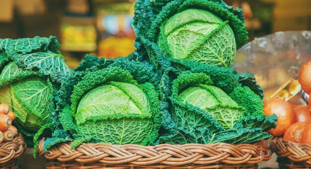 Cabbage is sold in the market. Selective focus.