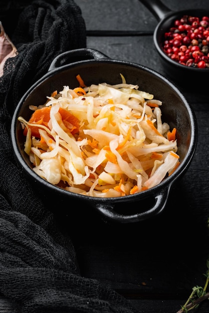 Cabbage preserving set, on black wooden table background