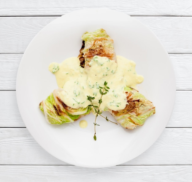 Cabbage rolls with sour cream sauce