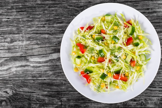 Cabbage salad with bell pepper and corn