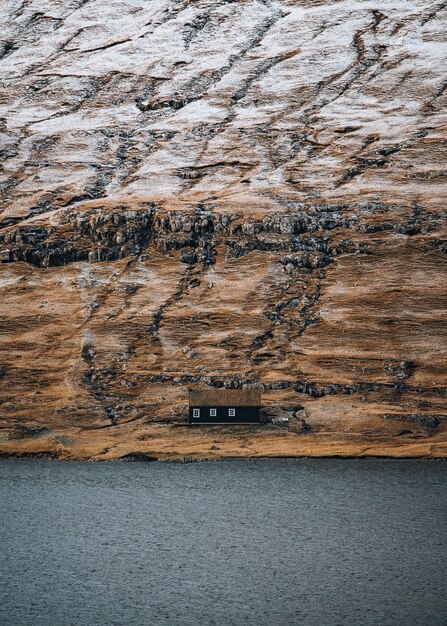 Cabin by the cliff on Faroe island, Denmark